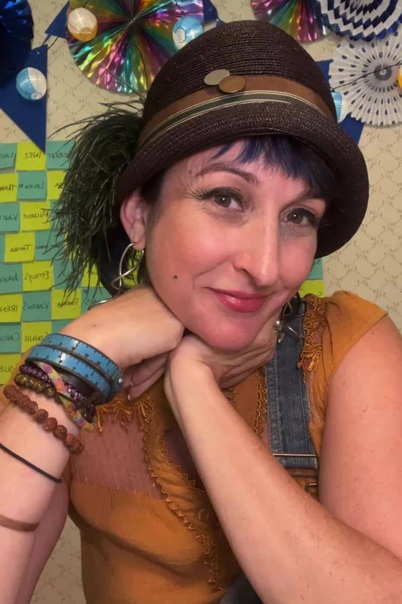 Tricia Camacho wearing a brown hat